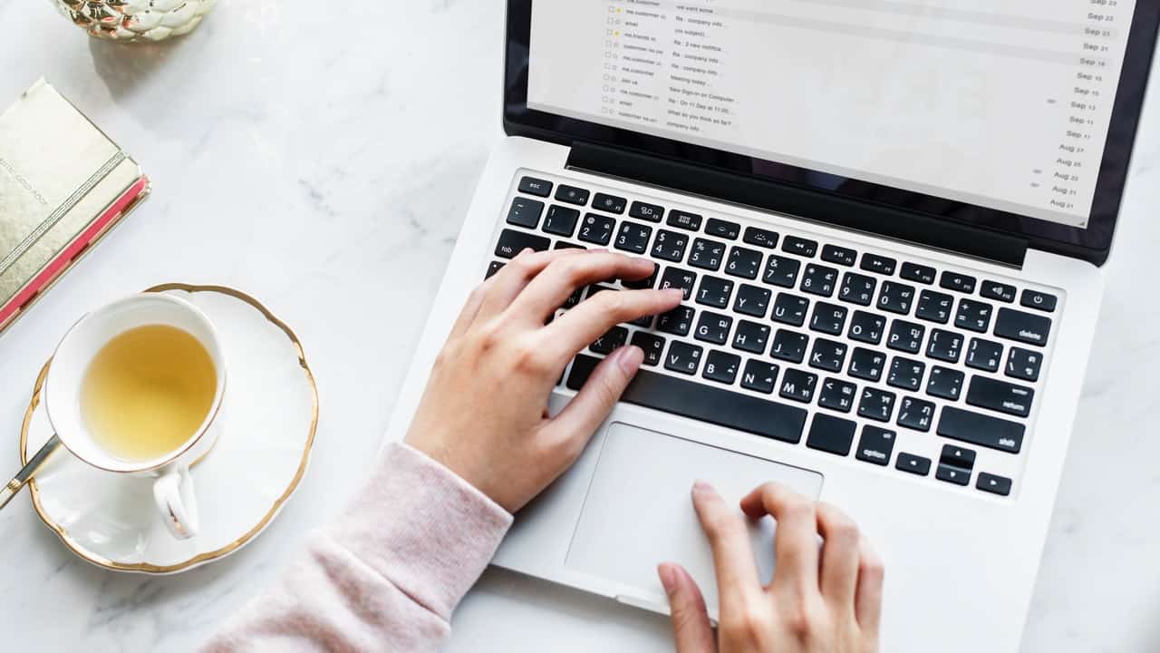 laptop image and hands of a woman | HOPLA